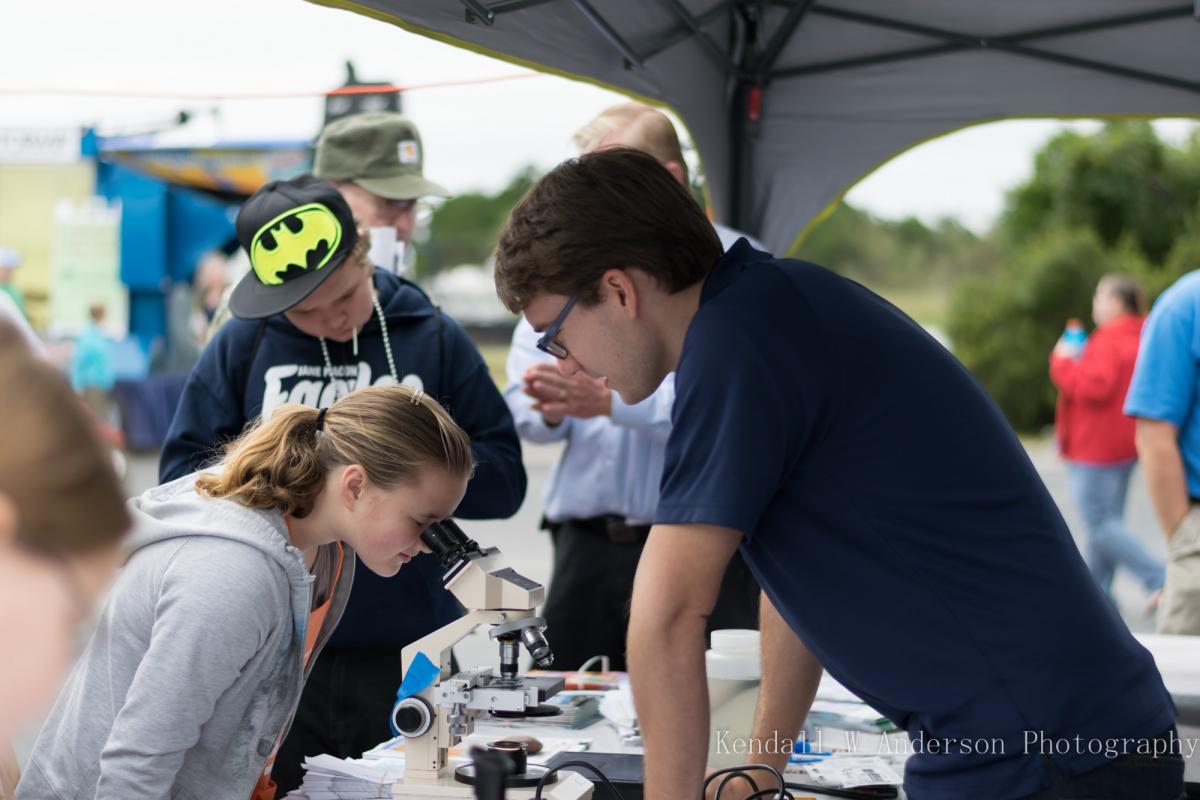 Photo of Dr. Aslan's students conducting outreach at CoastFest