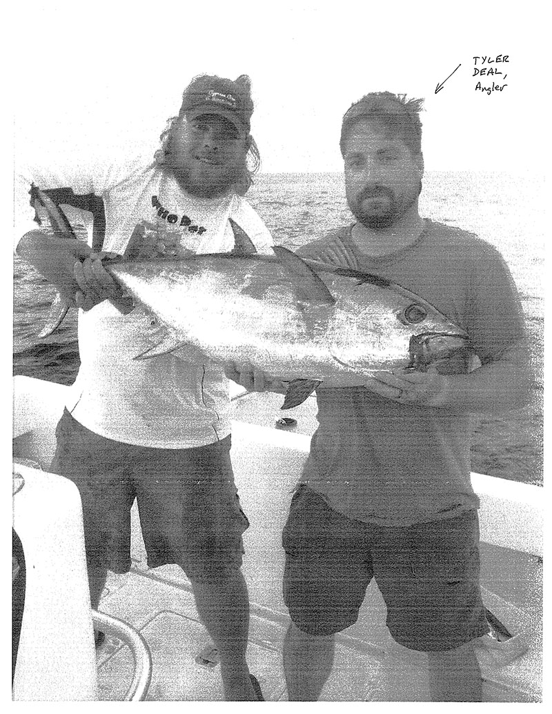 Tyler Deal (left) with record blackfin tuna