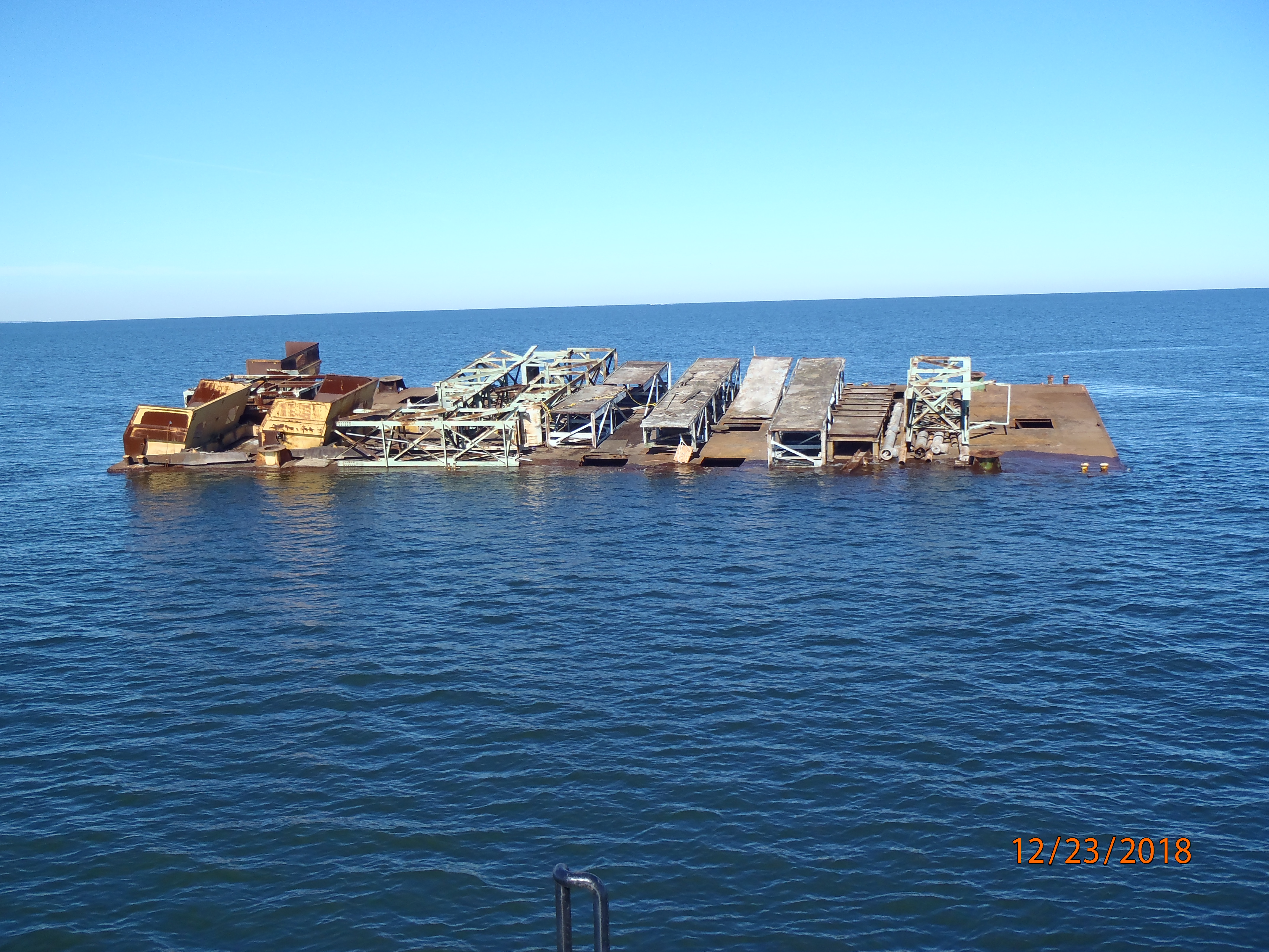 A barge filled with steel trusses and other post-industrial materials is sank Dec. 23, 2018, off the coast of Georgia. 