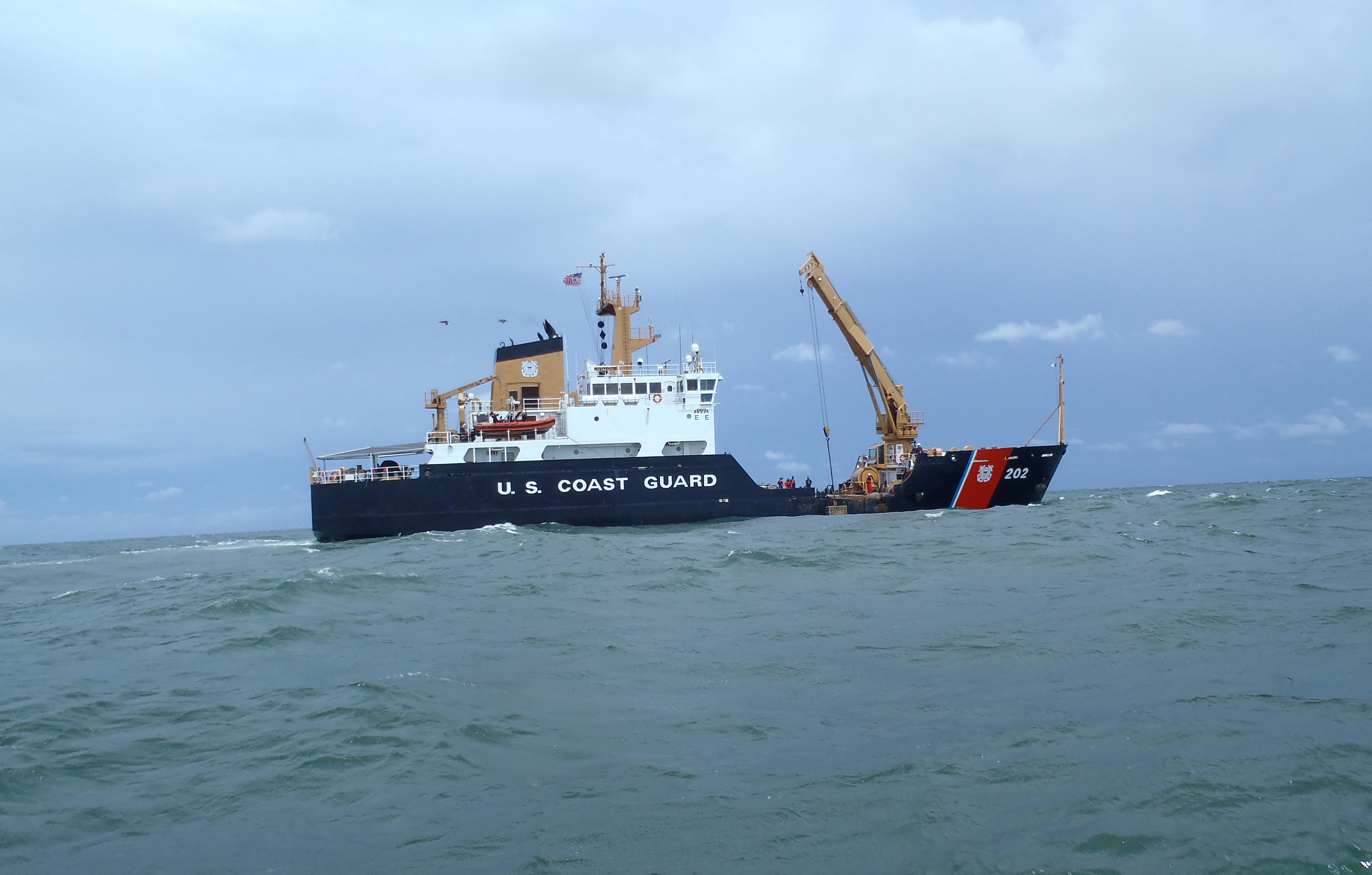 Coast Guard Cutter Willow deploys concrete sinkers at artificial reef BSF near Tybee Island, Ga., on June 12, 2019.