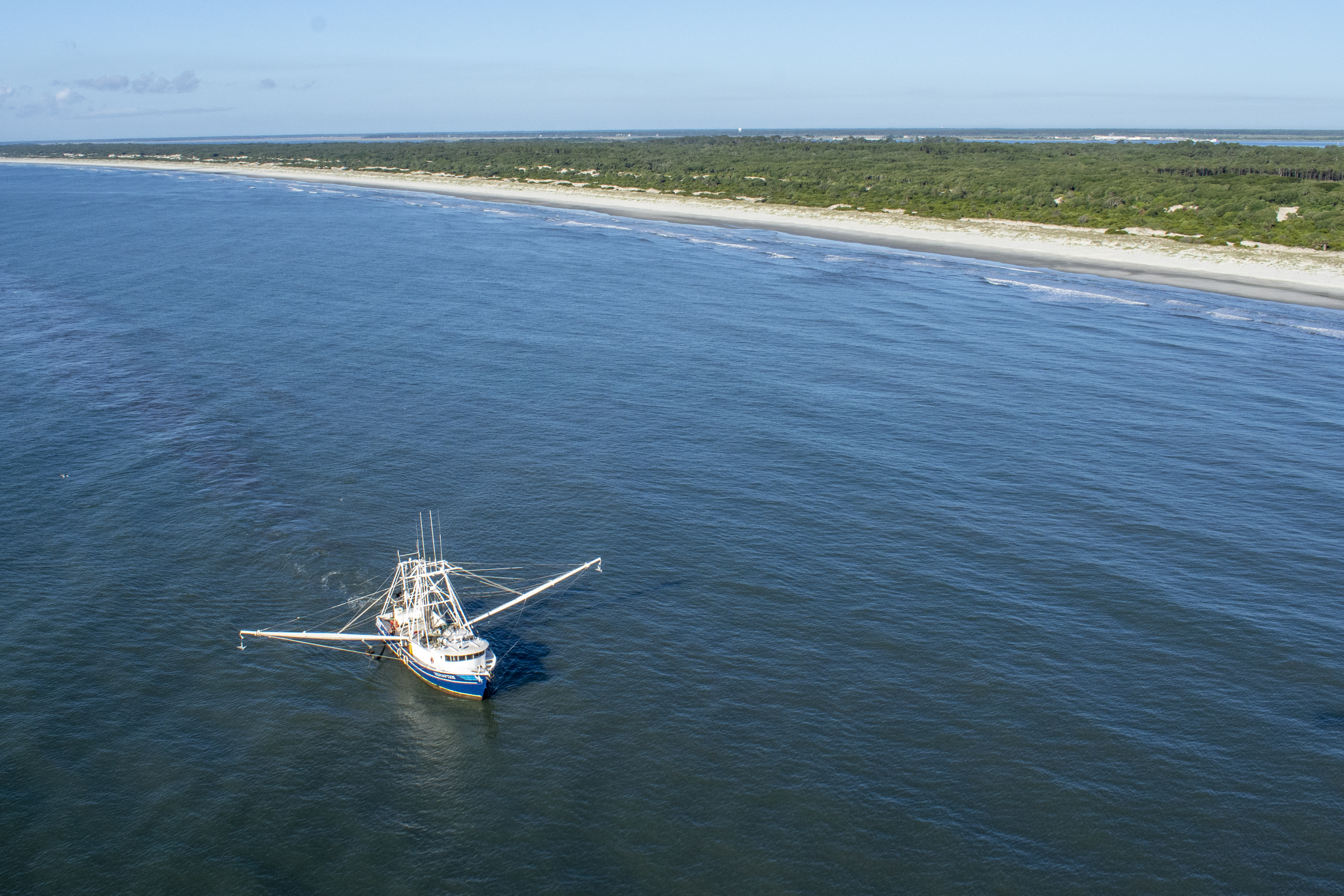 A shrimp boat is seen off Sapelo Island on June 1, 2022. DNR photo by Tyler Jones.