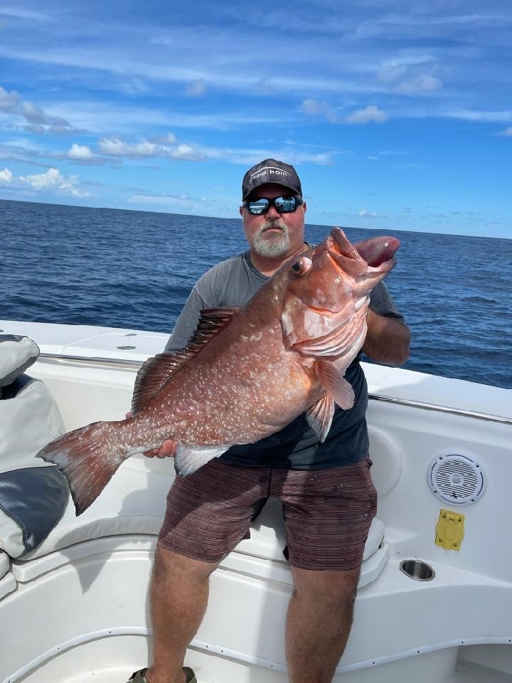 Bruce Bartlett Jr. with record red grouper