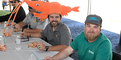 DNR Staff at the shrimp eating contest at CoastFest (thumbnail for the CoastFest article)