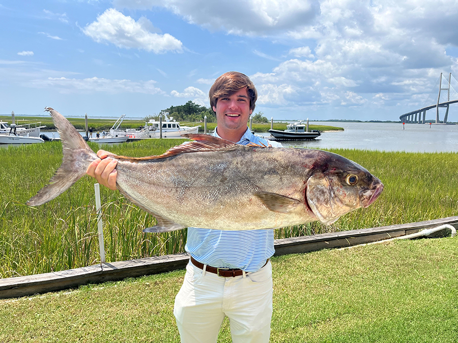 James W. Thompson with almaco jack.