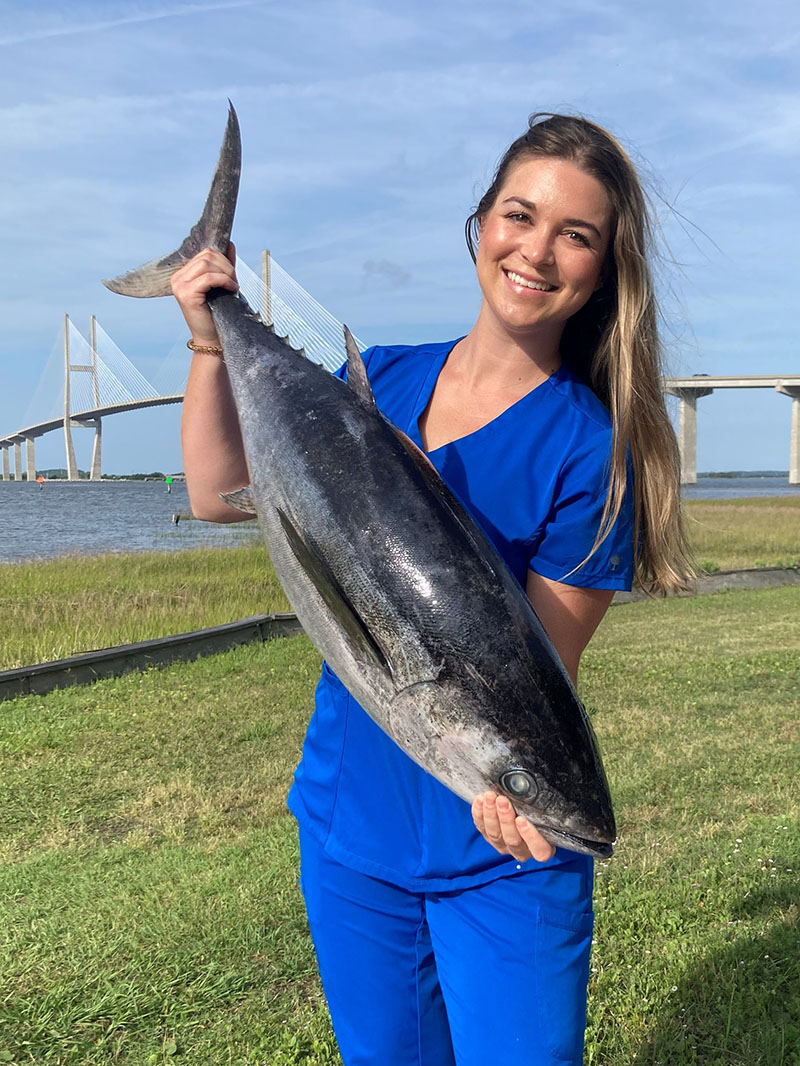 Molly Strickland with Blackfin Tuna. DNR photo by Tyler Jones..