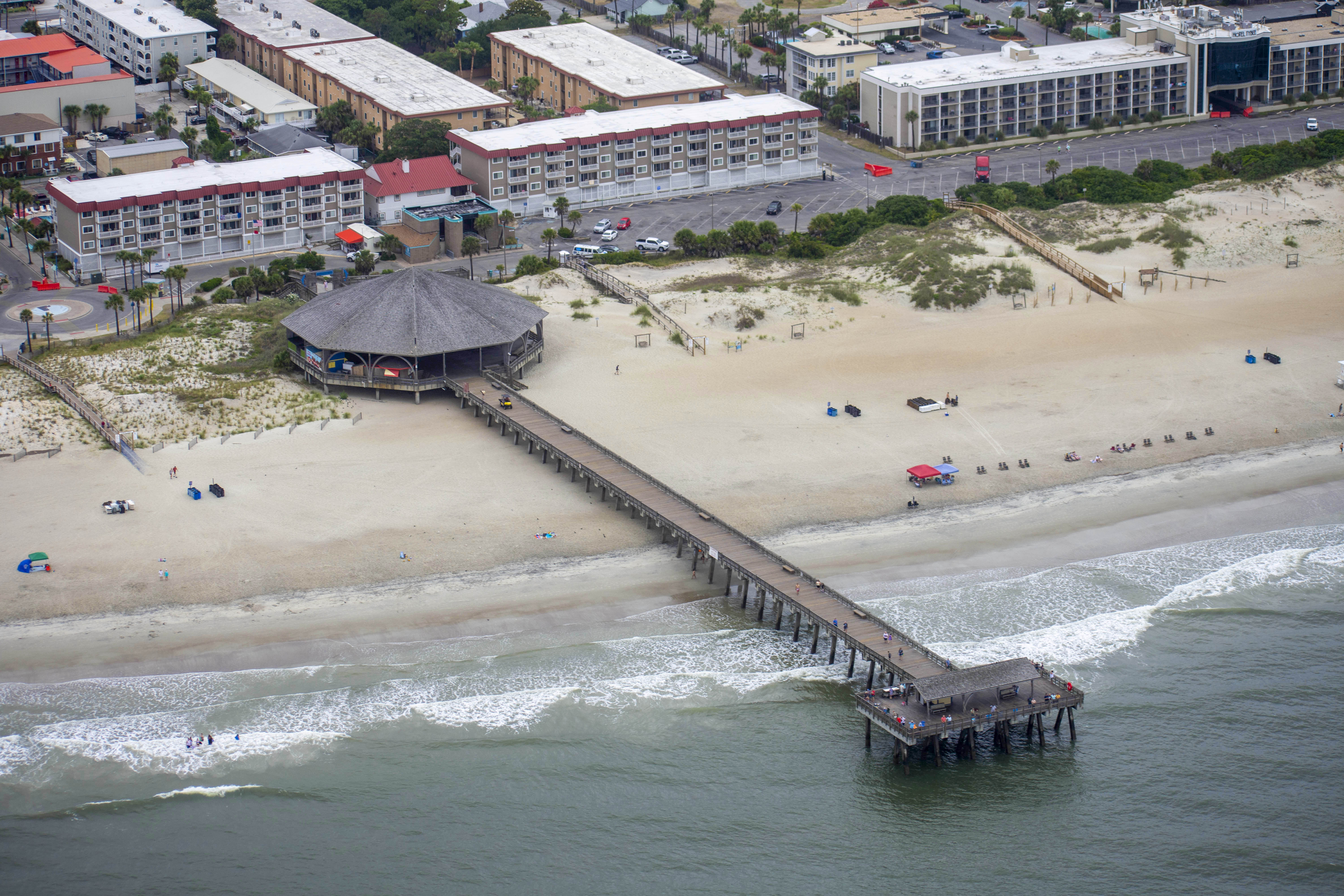 The Tybee Island beaches and fishing pier on Tybee Island, Ga. As one of Georgia’s three beaches accessible by car, Tybee is a crowd favorite for beachcombing.