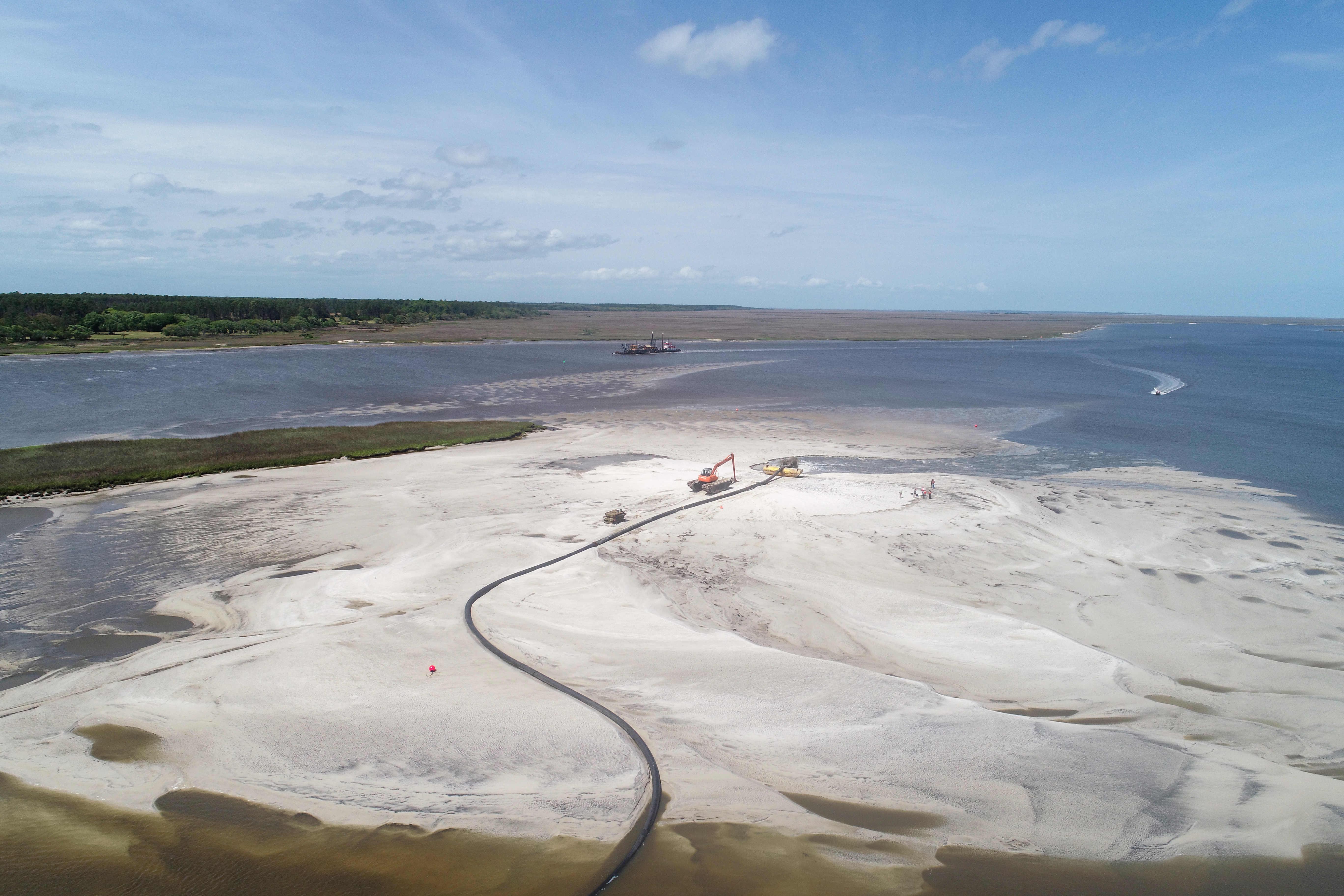 This photo from an unmanned aerial vehicle shows dredge material being deposited onto a newly man-made bird island at Cumberland Dividings in Camden County. The beneficial use of sediment project will provide new habitat for migrating birds and horseshoe crabs. Max Kleinshans/CRD.
