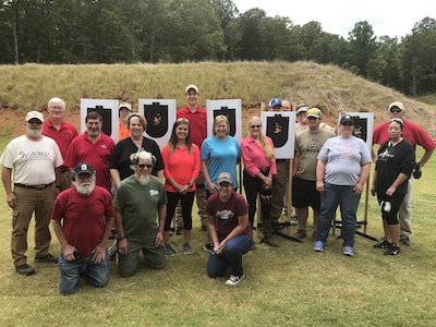 Give It a Shot Class Standing on Range with Targets