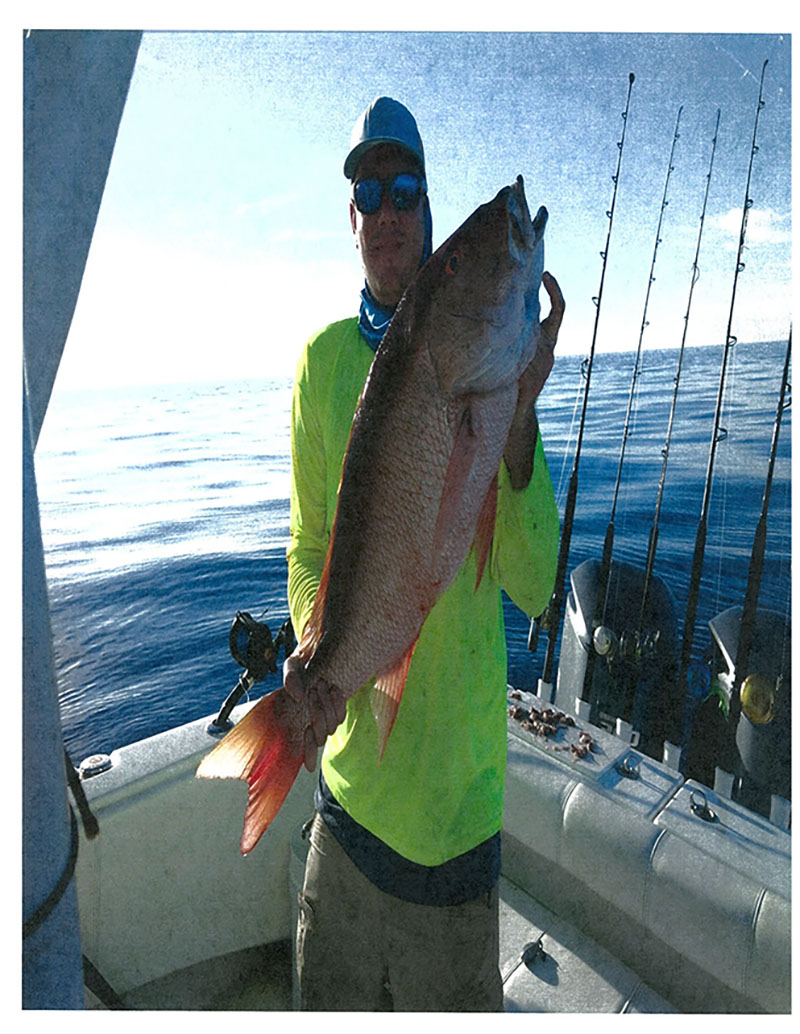 Benjamin Lewis with Mutton Snapper