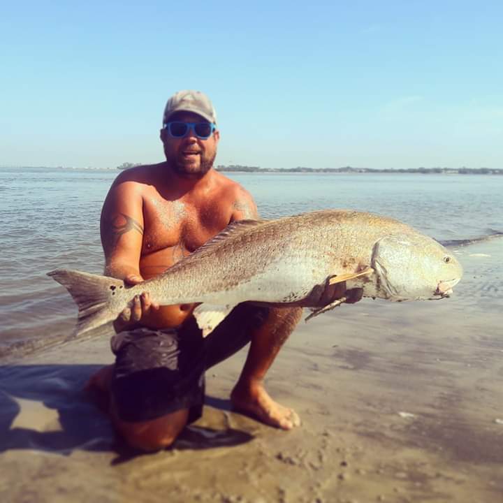 Man with redfish